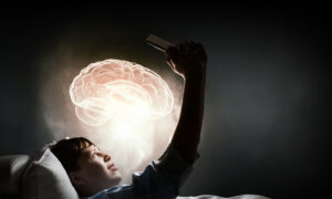 teenage boy in bed using phone with brain lighting up, sleep dependency, sleep problems